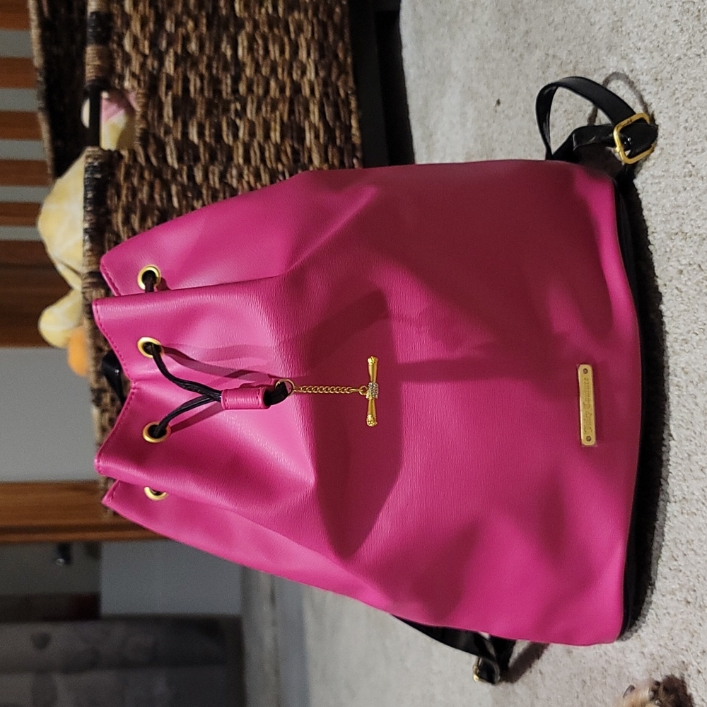 Juicy couture sinch booking. Leather like. Never used.